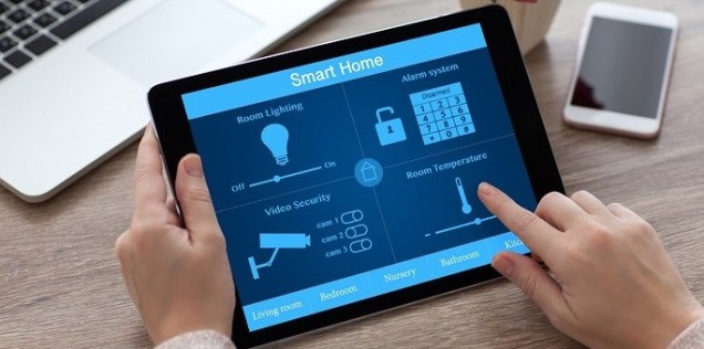woman-changing-smart-home-settings-on-tablet_iStock._resized